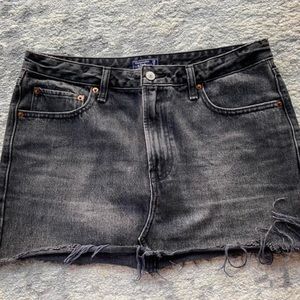 Black denim mini skirt